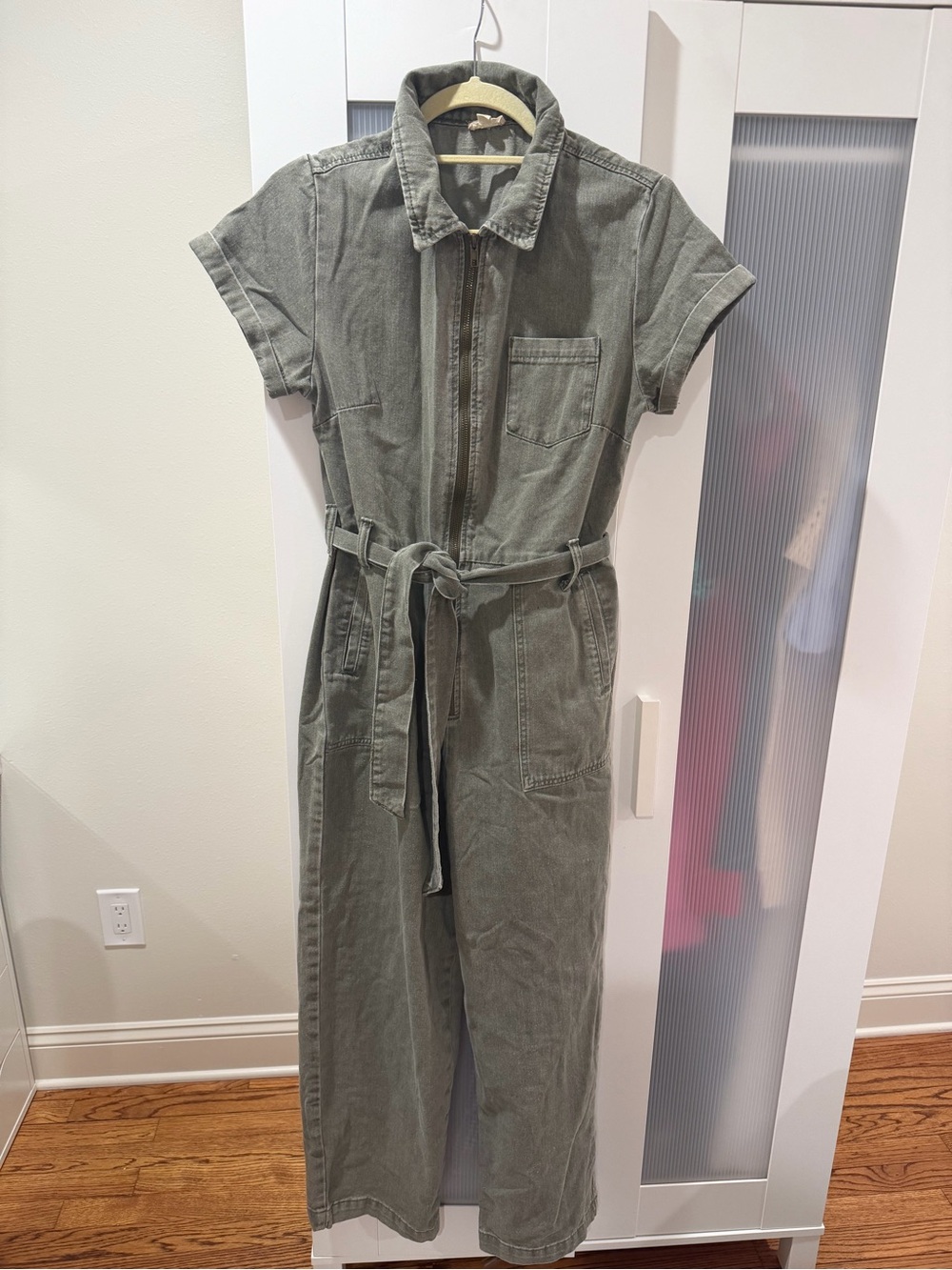 Women's Olive Utility Jumpsuit with Tie Waist in denim like material.